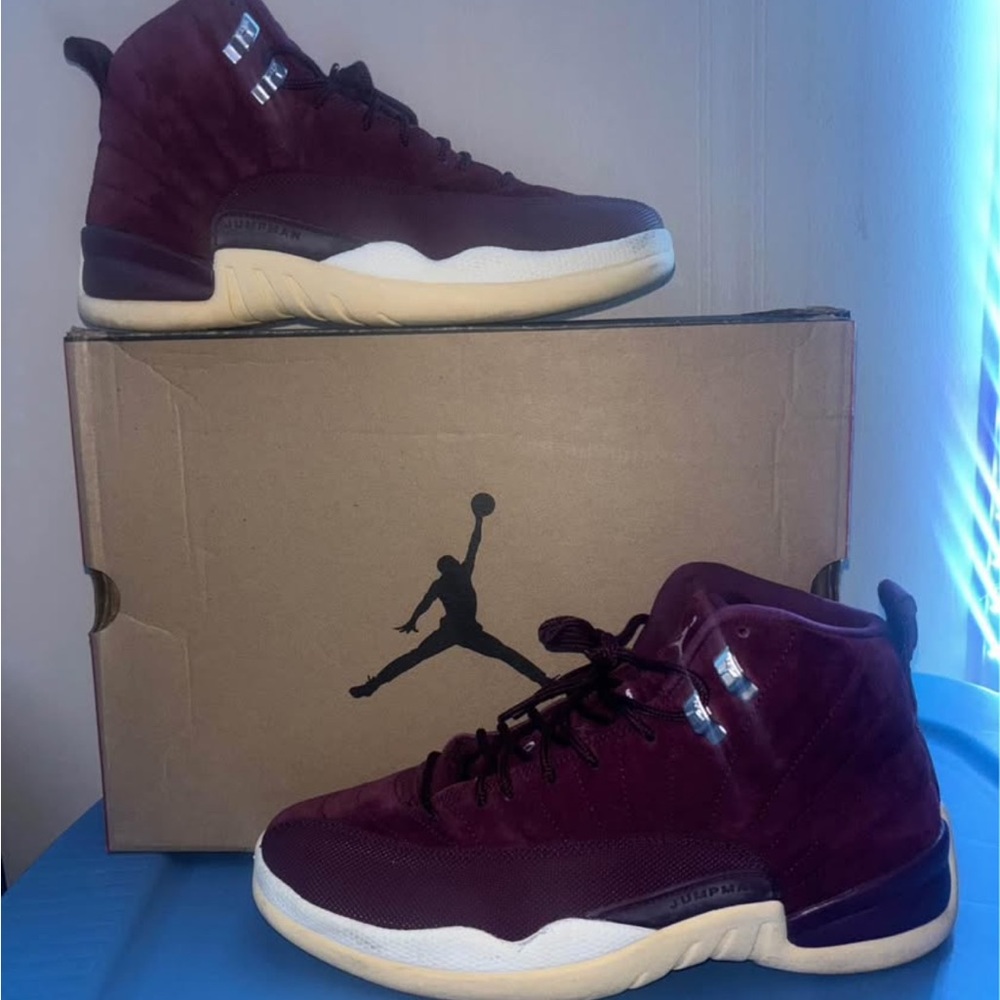 Jordan 12s men size 10 burgundy and white gently worn.